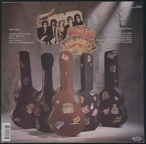 Bob Dylan ( Traveling Wilburys)- The Traveling Wilburys Volume One