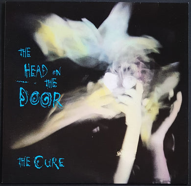 Cure - The Head On The Door