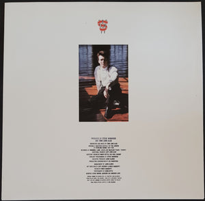 Steve Winwood - Roll With It