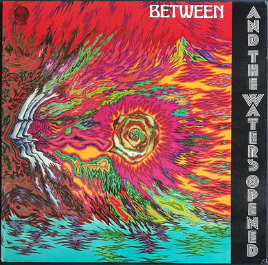 Between - And The Waters Opened