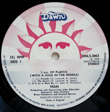 Load image into Gallery viewer, Man - 2 Ozs. Of Plastic With A Hole In The Middle