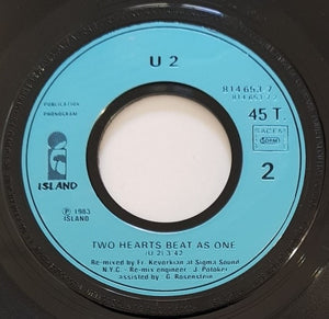 U2 - Two Hearts Beat As One