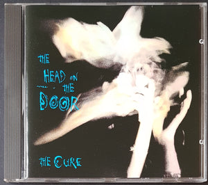 Cure - The Head On The Door