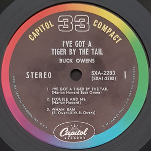 Buck Owens - I've Got A Tiger By The Tail