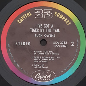 Buck Owens - I've Got A Tiger By The Tail