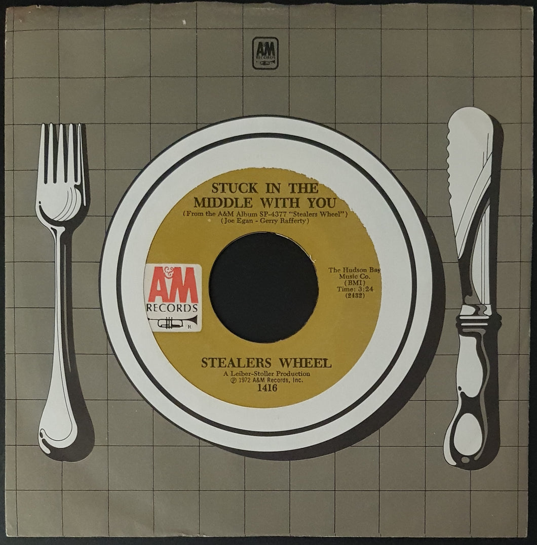 Stealers Wheel - Stuck In The Middle With You