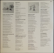 Load image into Gallery viewer, Jimmy Buffett - Riddles In The Sand