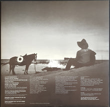 Load image into Gallery viewer, Jimmy Buffett - Riddles In The Sand