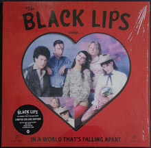 Load image into Gallery viewer, Black Lips - In A World That&#39;s Falling Apart - Red Vinyl